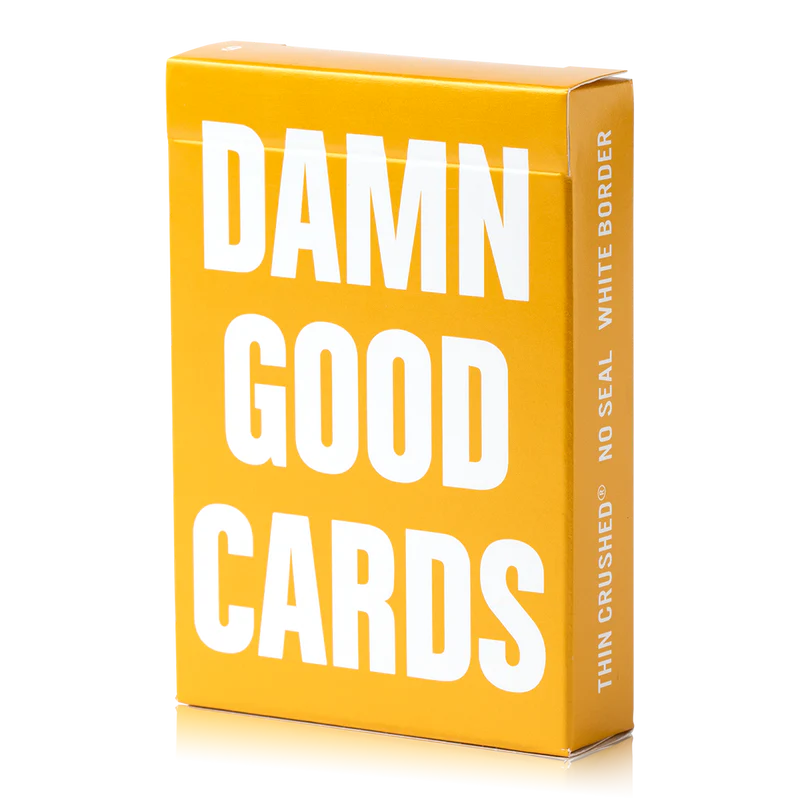 Gold card box with 'Damn Good Cards' text on a white background